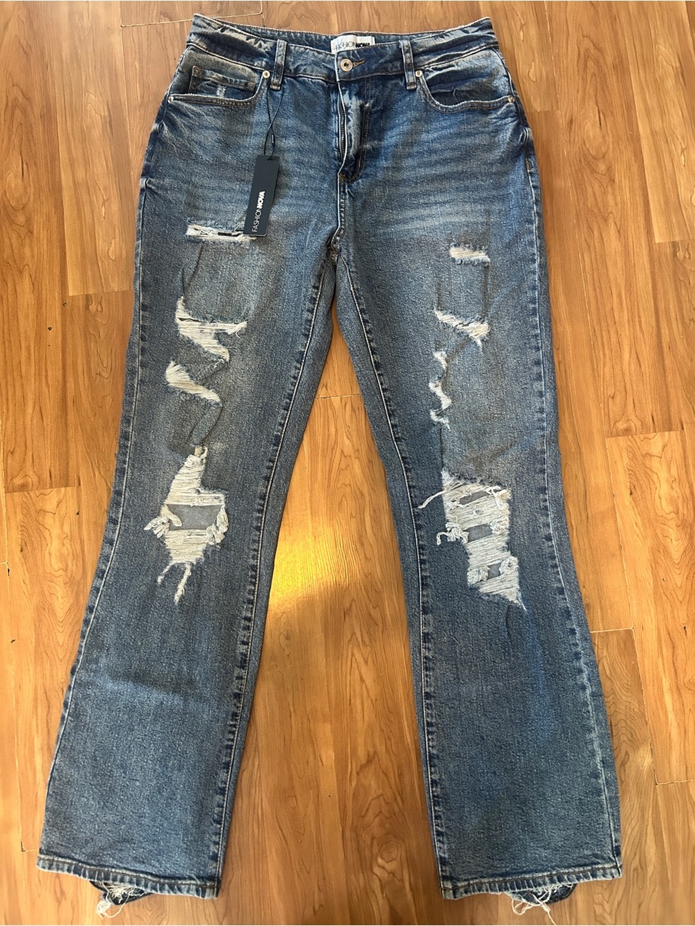 Fashion Nova Distressed Blue Flare Jeans